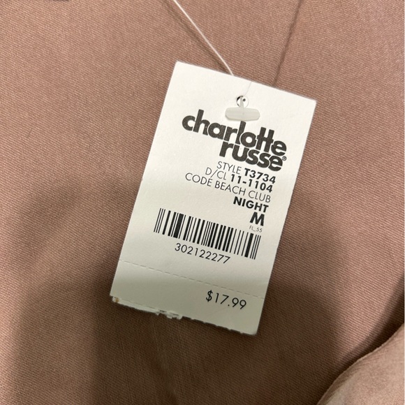 Mauve colored top and shorts.
Stretchy - Picture 12 of 12